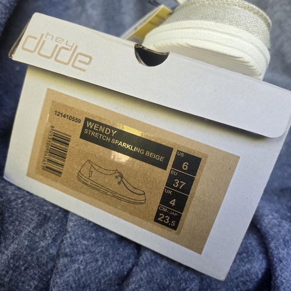 Ladies Hey Dude shoes. Gold shimmer color. - Picture 5 of 6